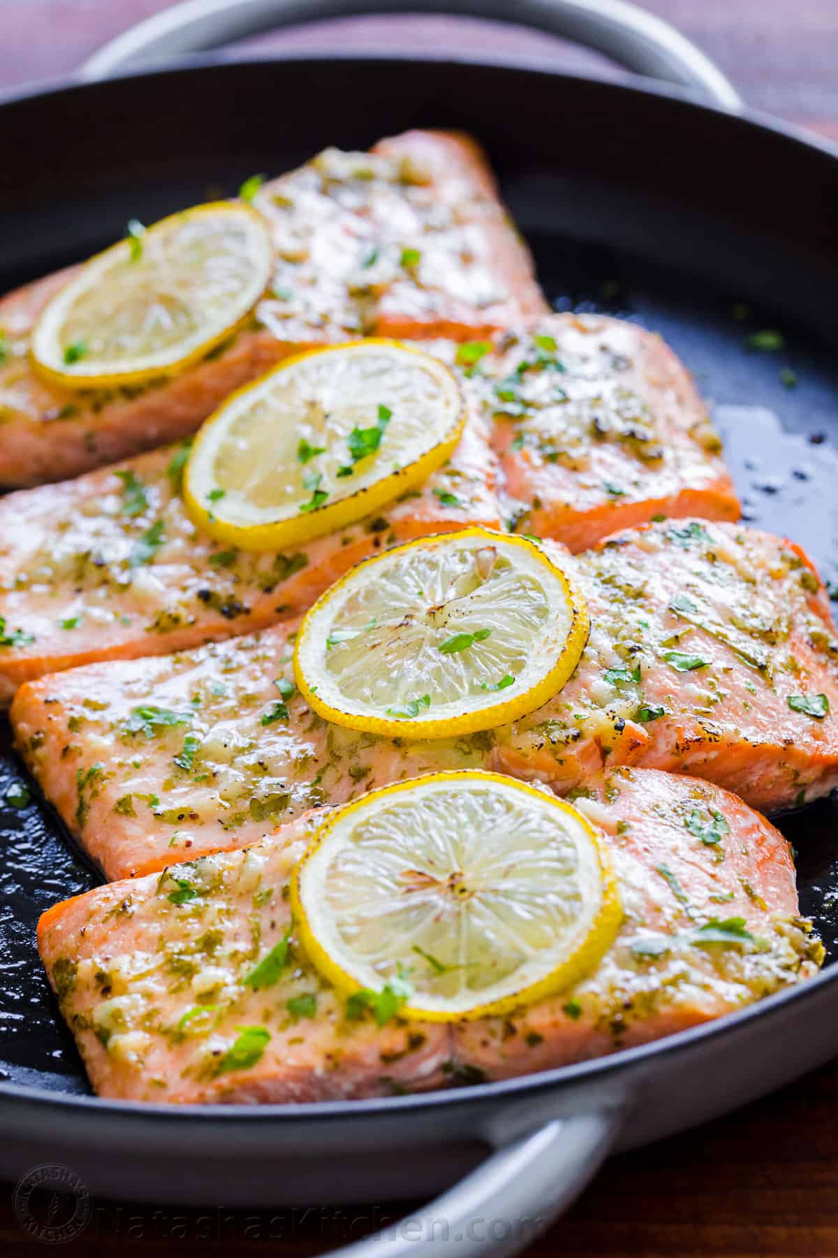 Easy baked salmon recipe with lemon, garlic, and herbs