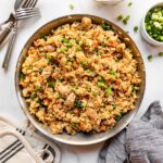 Classic Chinese-style chicken fried rice in a wok