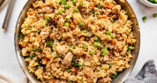 Classic Chinese-style chicken fried rice in a wok