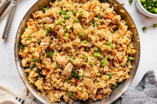 Classic Chinese-style chicken fried rice in a wok