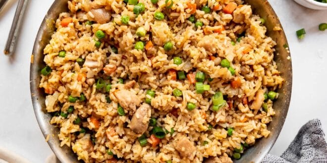 Classic Chinese-style chicken fried rice in a wok