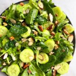 Fresh green salad with lettuce, cucumber, and light vinaigrette