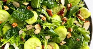 Fresh green salad with lettuce, cucumber, and light vinaigrette