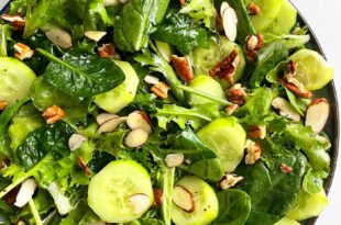 Fresh green salad with lettuce, cucumber, and light vinaigrette