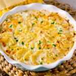 Creamy scalloped potatoes recipe baked with cheese and cream