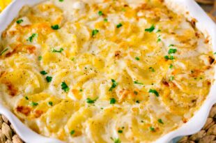 Creamy scalloped potatoes recipe baked with cheese and cream