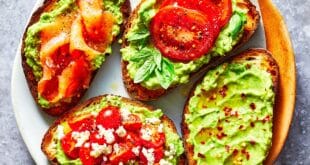 Creamy avocado toast with poached egg, chili flakes, and lemon zest