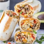 Breakfast burrito filled with eggs, potatoes, and cheese