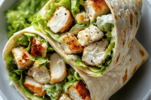 Easy Caesar salad wrap recipe with chicken, lettuce, and creamy dressing