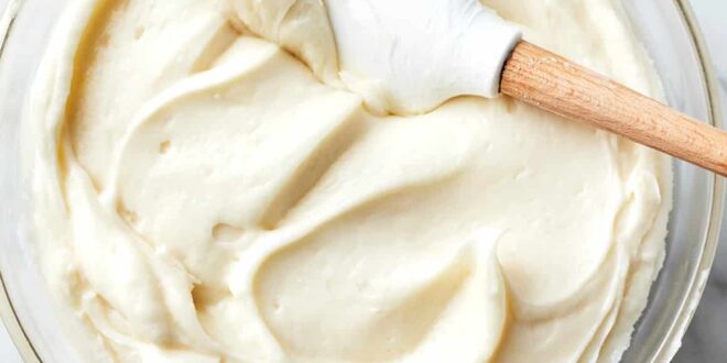 Smooth and creamy homemade cream cheese frosting for cakes and cupcakes