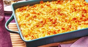 Creamy cheesy funeral potatoes casserole topped with crispy cornflakes
