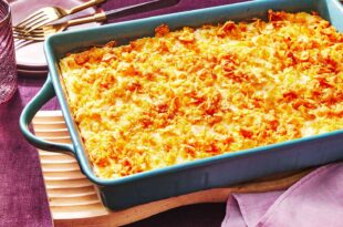 Creamy cheesy funeral potatoes casserole topped with crispy cornflakes
