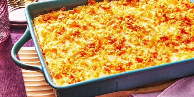 Creamy cheesy funeral potatoes casserole topped with crispy cornflakes