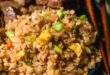 Japanese hibachi fried rice with vegetables, egg, and garlic butter