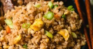Japanese hibachi fried rice with vegetables, egg, and garlic butter