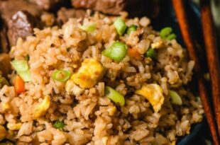 Japanese hibachi fried rice with vegetables, egg, and garlic butter