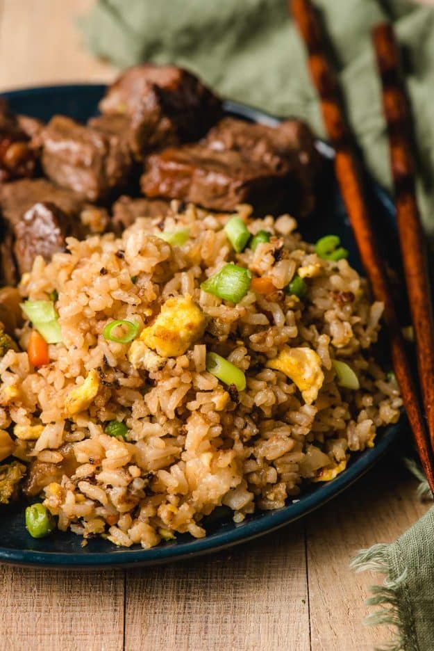 Japanese hibachi fried rice with vegetables, egg, and garlic butter