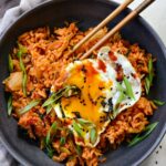 Spicy kimchi fried rice recipe with egg and green onions