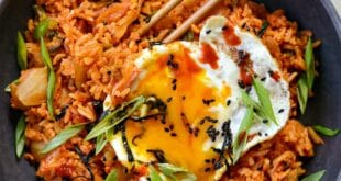 Spicy kimchi fried rice recipe with egg and green onions