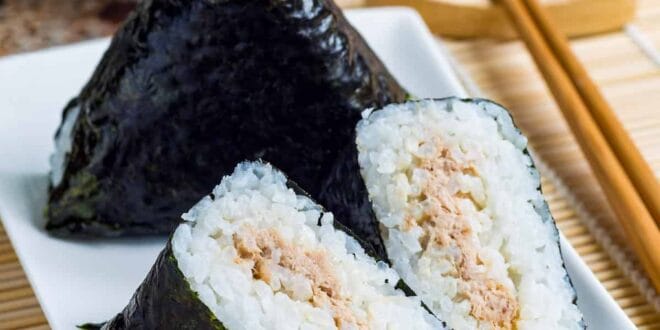 Japanese onigiri rice balls wrapped in seaweed with savory fillings