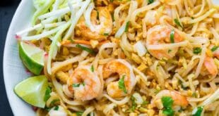 Authentic Pad Thai with shrimp, rice noodles, and crushed peanuts