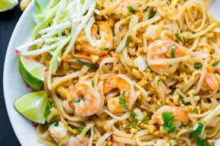 Authentic Pad Thai with shrimp, rice noodles, and crushed peanuts