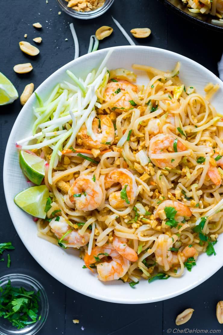 Authentic Pad Thai with shrimp, rice noodles, and crushed peanuts