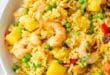 Pineapple Fried Rice Recipe | Easy Thai-Inspired Dish 19 Thai-style pineapple fried rice recipe with shrimp and cashews