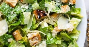 Caesar salad with romaine lettuce, parmesan cheese, and crispy croutons