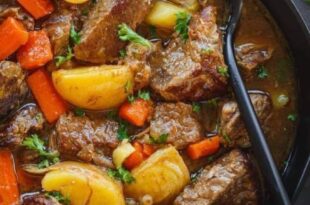 Hearty slow cooker beef stew recipe with tender meat and vegetables
