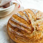 Homemade sourdough bread recipe with crispy crust and soft crumb