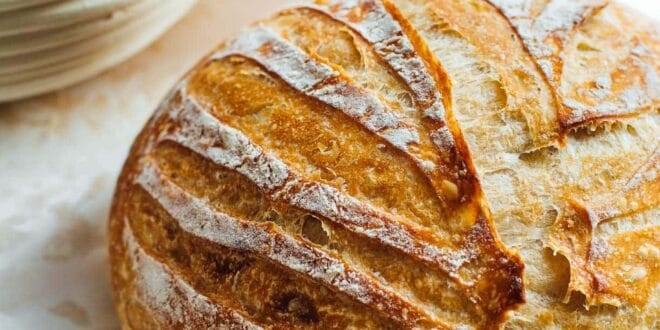 Homemade sourdough bread recipe with crispy crust and soft crumb