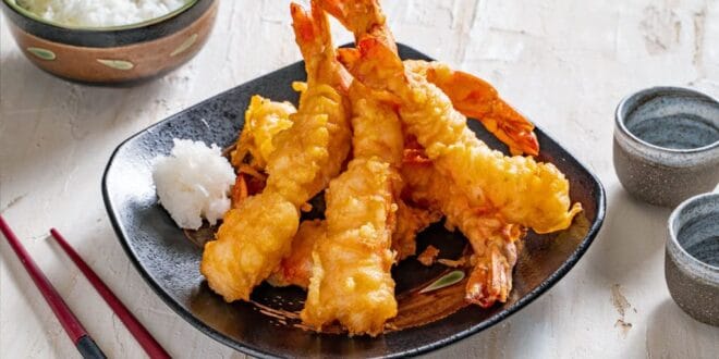 Crispy Japanese tempura shrimp and vegetables with dipping sauce