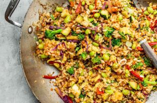 Easy vegetable fried rice recipe with carrots, peas, and soy sauce