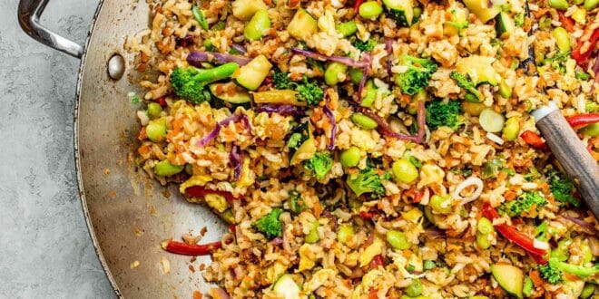 Easy vegetable fried rice recipe with carrots, peas, and soy sauce