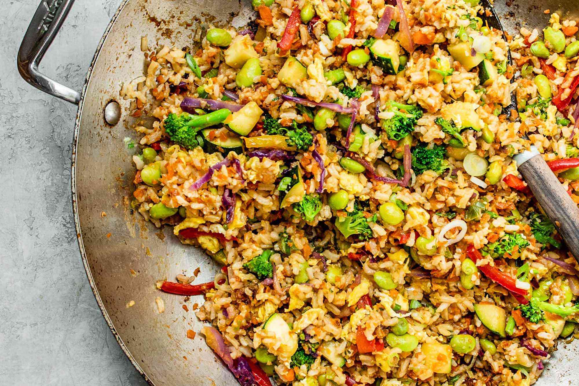 Easy vegetable fried rice recipe with carrots, peas, and soy sauce
